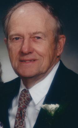 Claude "Buddy" Melanson